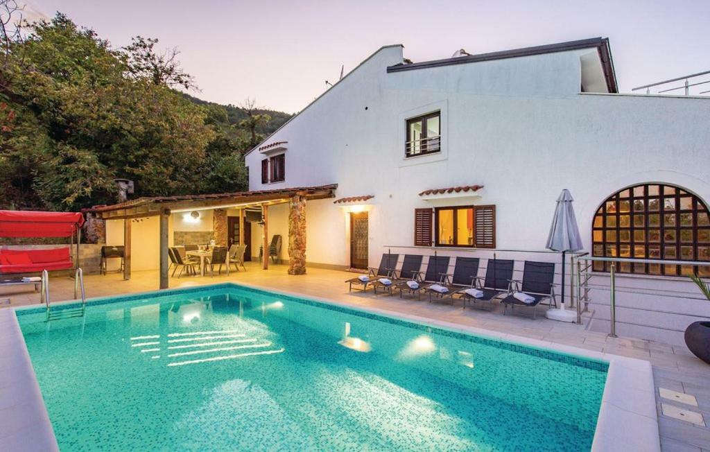 Villa Nino Ловран Экстерьер фото